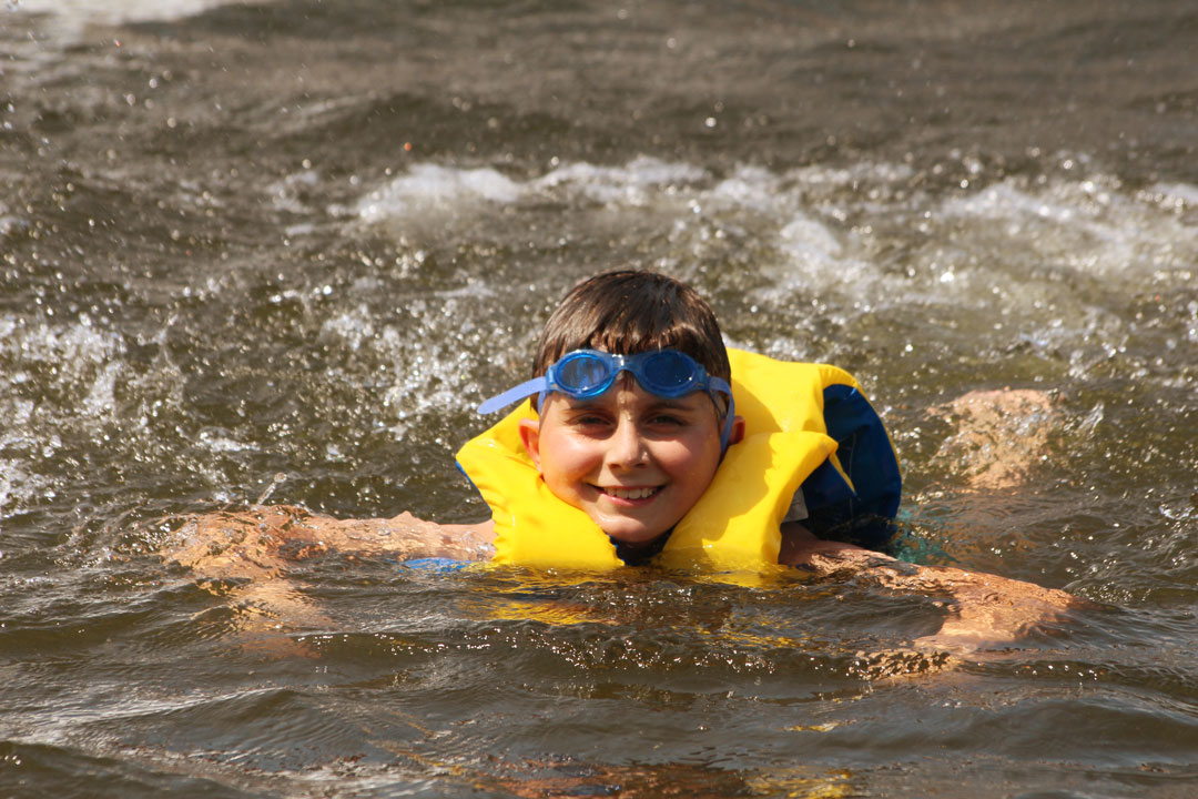 Children doing a tubing activity