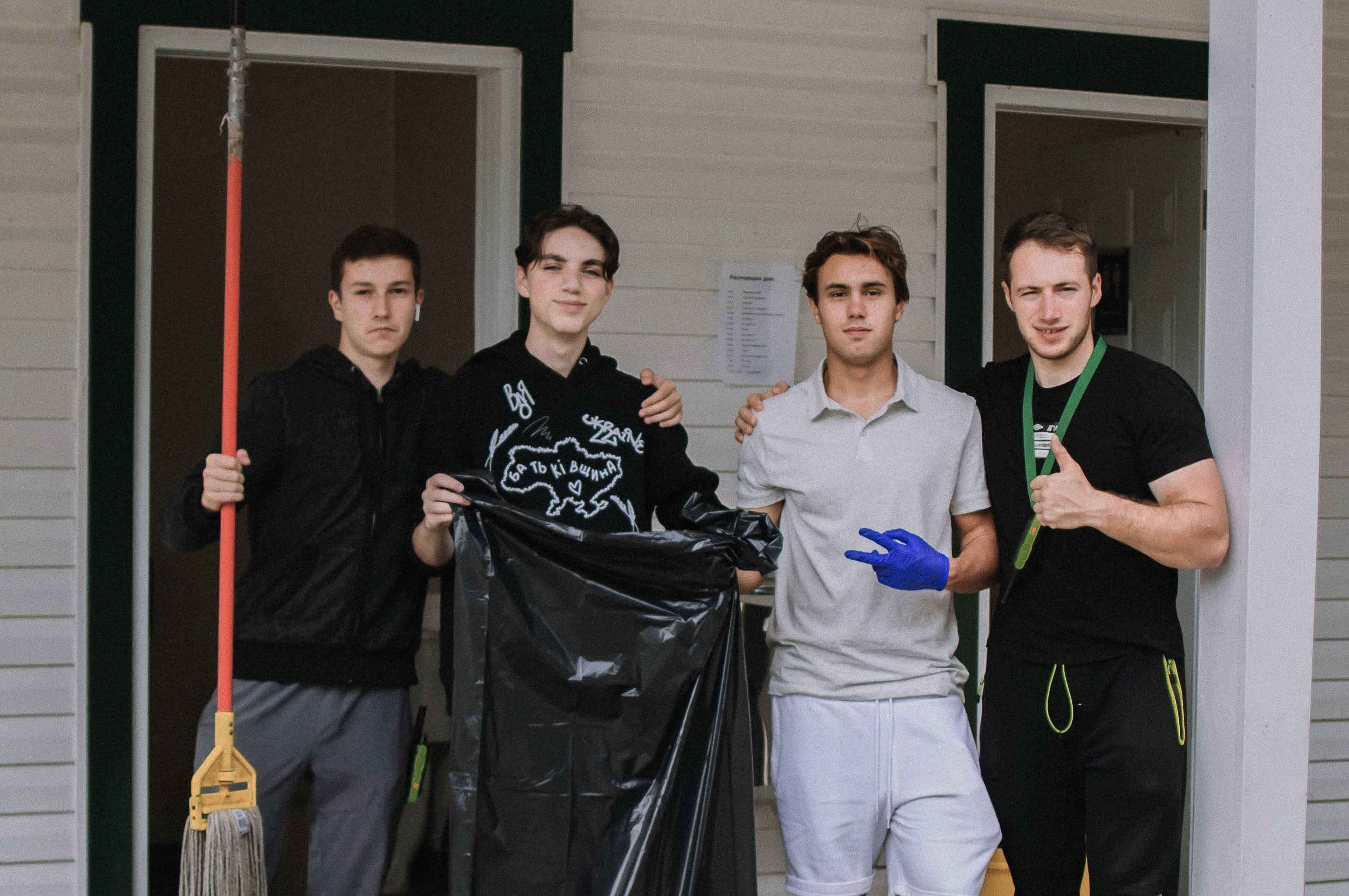 Interns smiling while working as a team